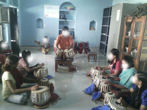 Guria-Center-girls-learn-traditional-drumming