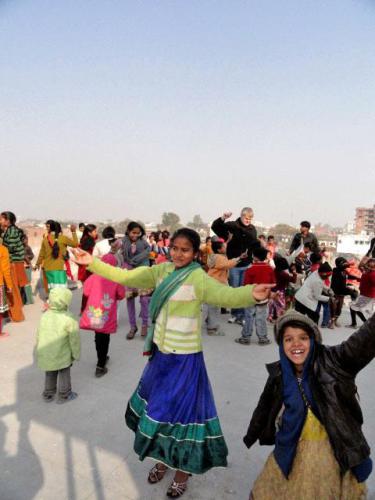 Gurias-after-school-center-in-Varanasi-celebrates-the-holidays-with-rooftop-dancing-dhol-music-and-delicious-Indian-sweets